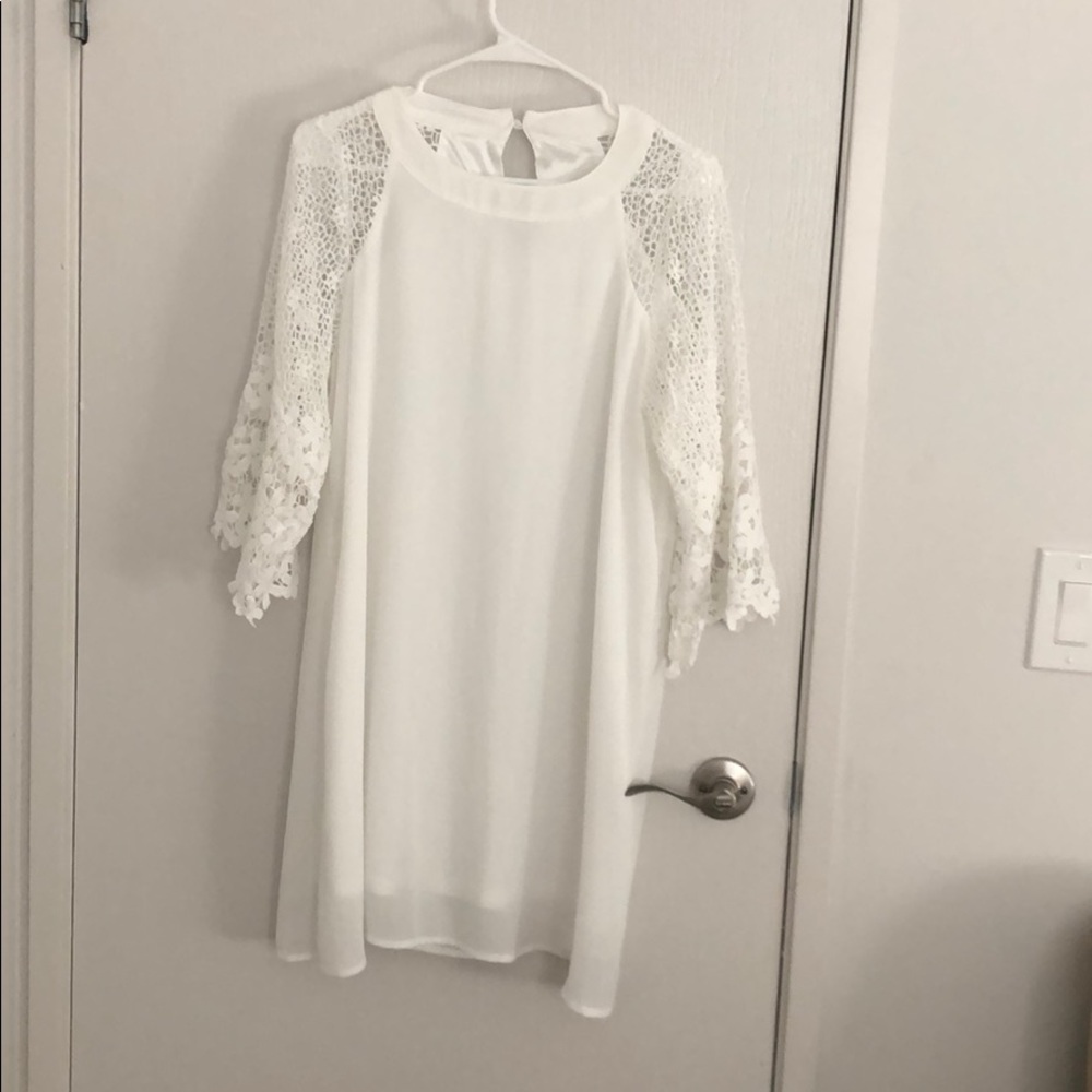 Mini dress with lace sleeves
